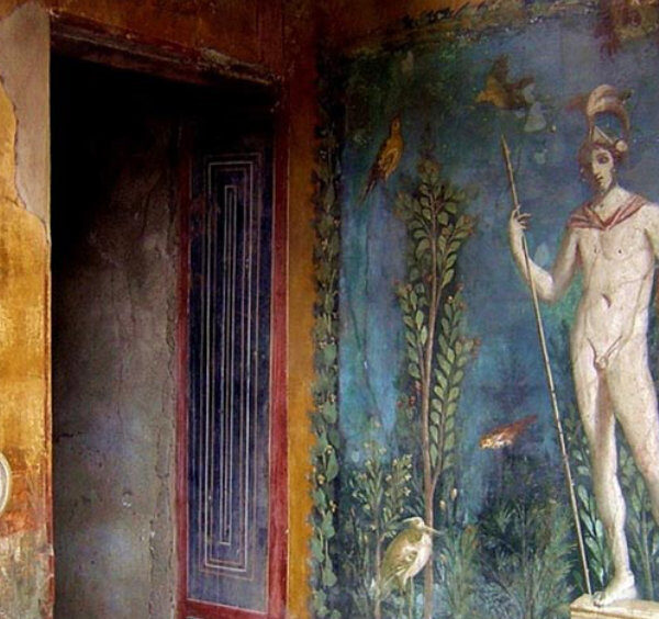 Fresque de la Maison des Vettii à Pompéi représentant un guerrier avec lance et bouclier sur fond bleu.