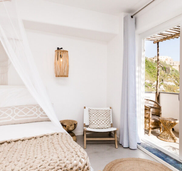 Chambre de boutique hôtel avec vue sur la mer à Procida.
