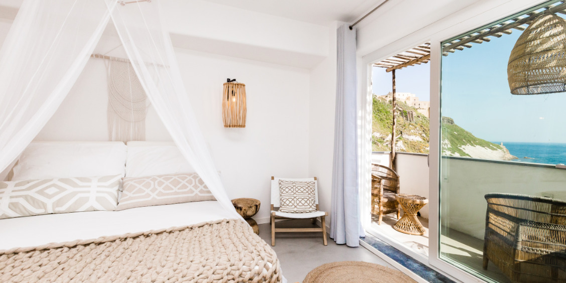 Chambre de boutique hôtel avec vue sur la mer à Procida.